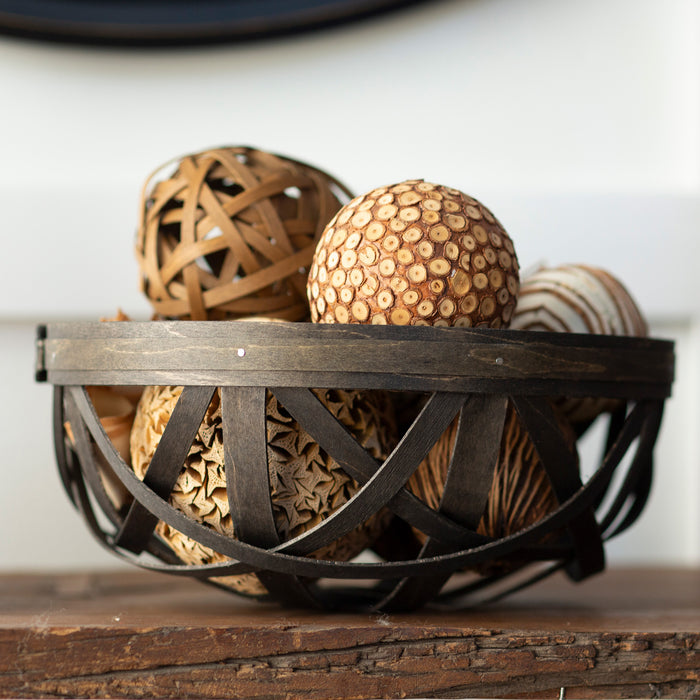 1896 Black Bowl Basket holding decorative balls
