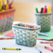 Longaberger x Crayola Small Crayon Basket Set - Pine Green holding crayons.