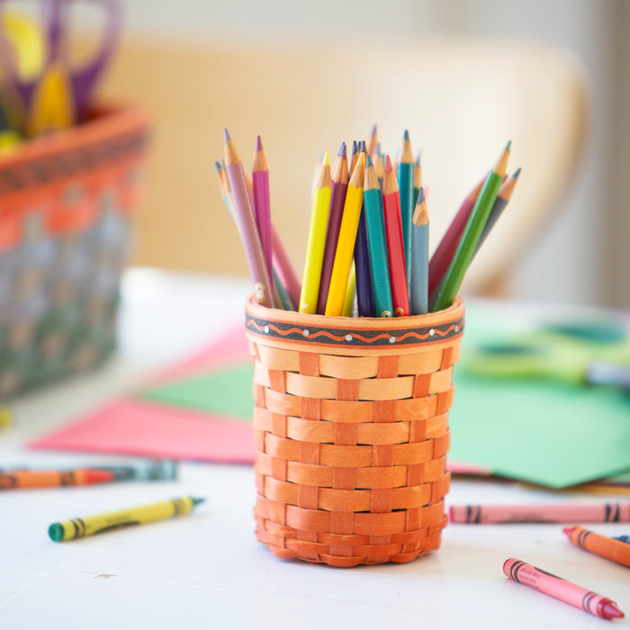 Longaberger x Crayola Marker Holder Basket Set - Apricot holding colored pencils.