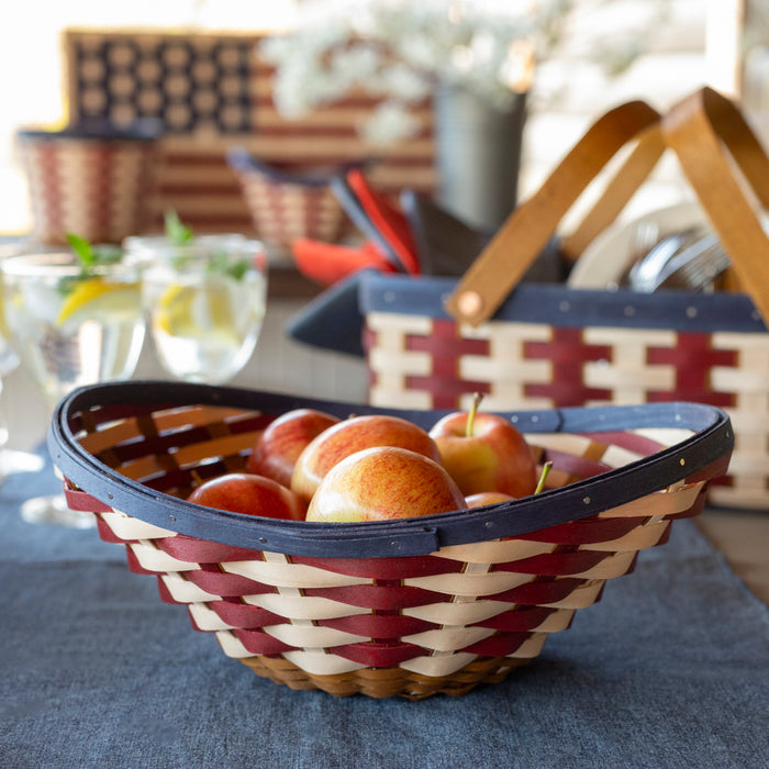 Americana Large Swoop Bowl Basket holding apples.