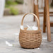 Small Flower Girl Basket Set with Protector - Light Brown holding petals.