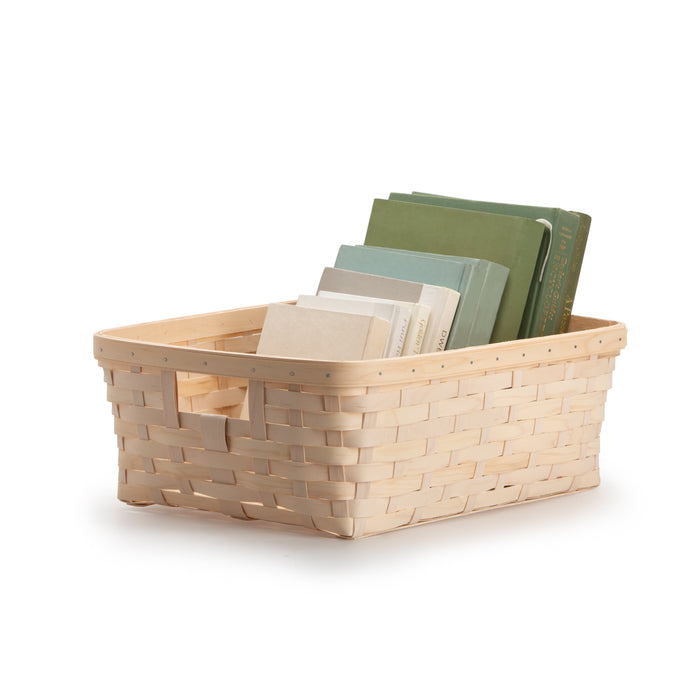 Whitewashed Large Rectangle Organizing Basket holding books.