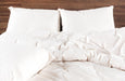 Wool comforter on bed
