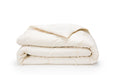 Wool comforter on white background
