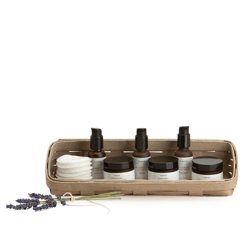 Pale Grey Large Skin Care Basket Set with Protector holding skin products.